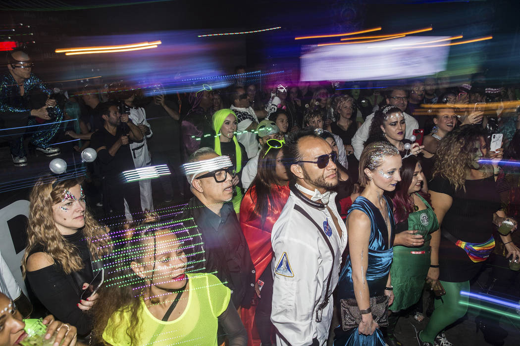 Attendees watch the Big Nazo Intergalactic Creature Band perform during a pre party for Storm A ...