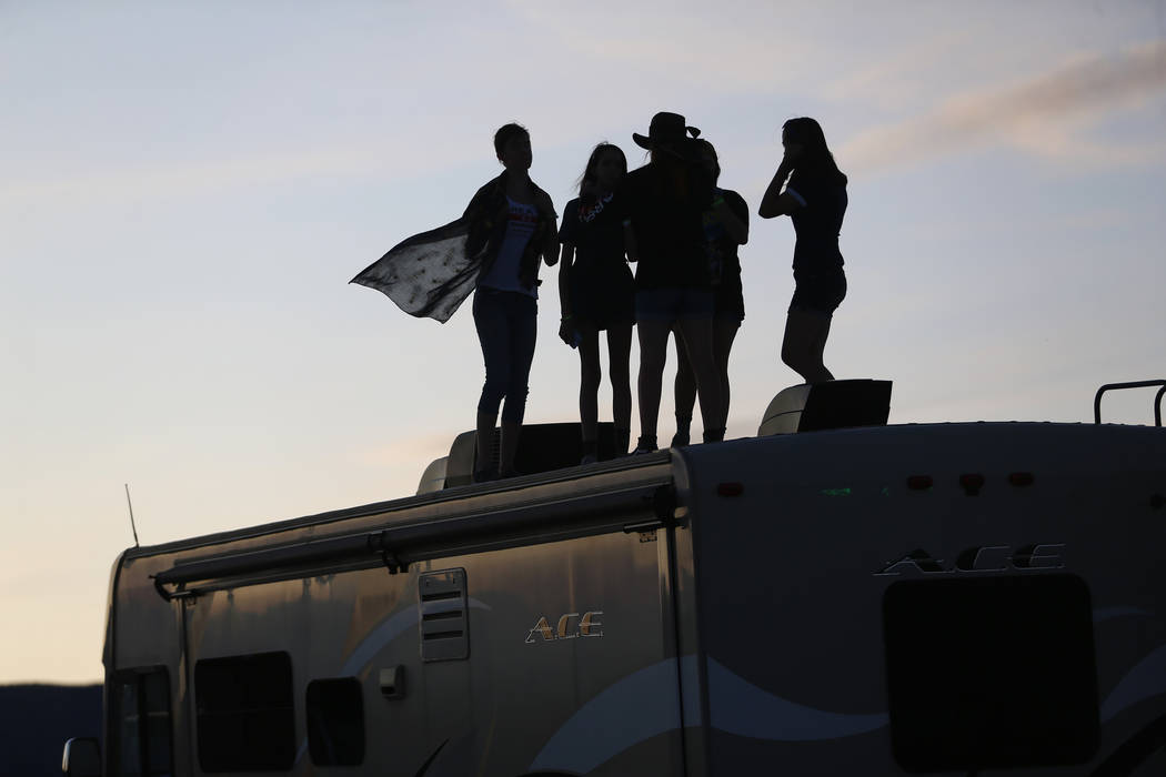 People attend the Alien Basecamp alien festival at the Alien Research Center in Hiko, Nev., Fri ...