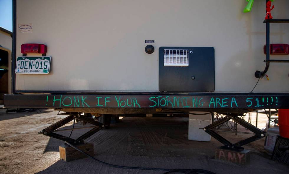 Sign on the bumper of an RV during the Alienstock festival on Friday, Sept. 20, 2019 in Rachel, ...