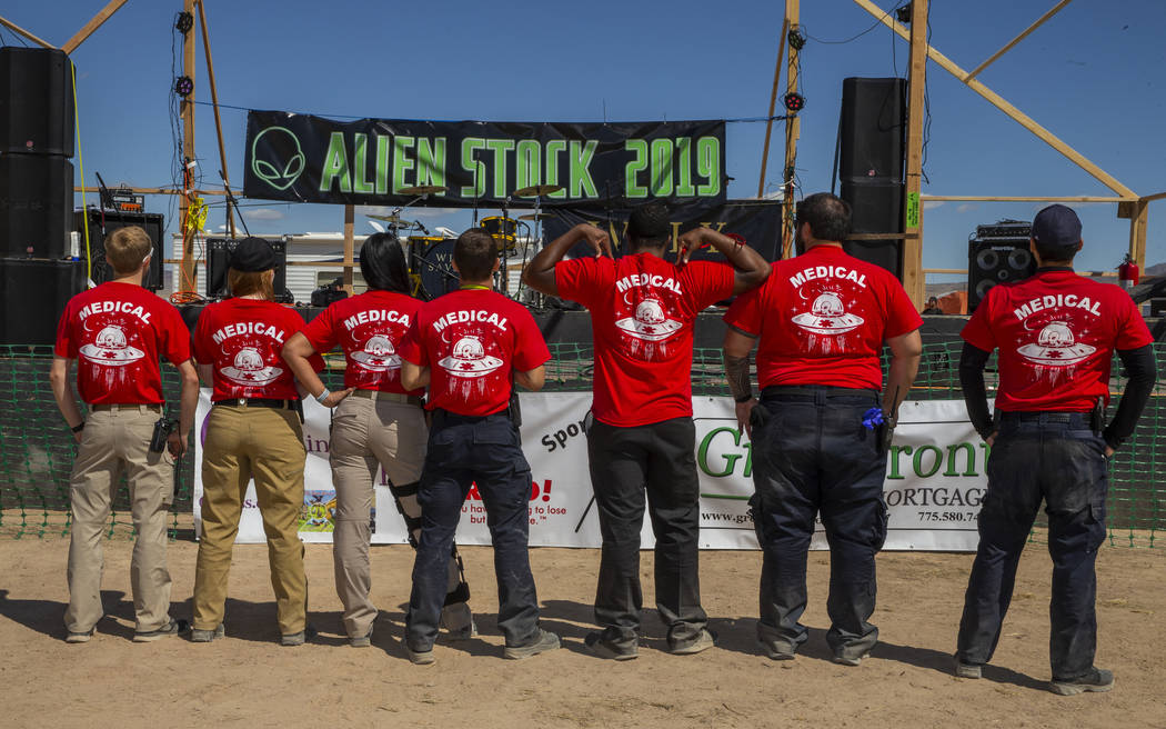 Medical personnel gather in front of the main stage during the Alienstock festival on Friday, S ...