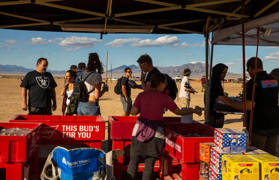 The Little A'Le'Inn sells drinks and merchandise from their booths during the Alienstock festiv ...