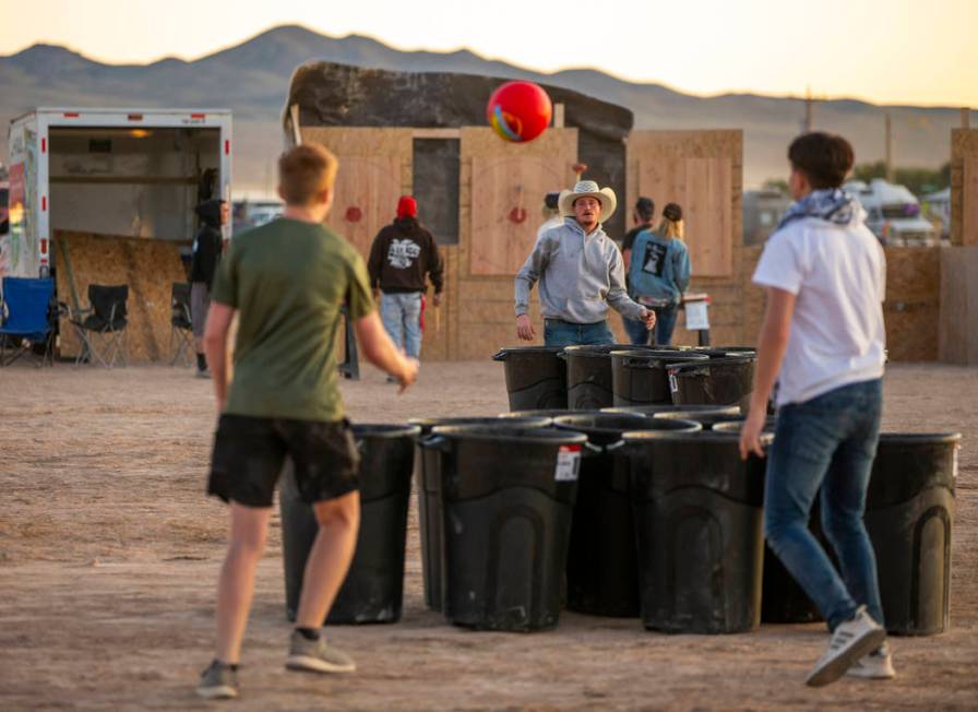 Festivalgoers play some trash can pong during the Alienstock festival on Friday, Sept. 20, 2019 ...