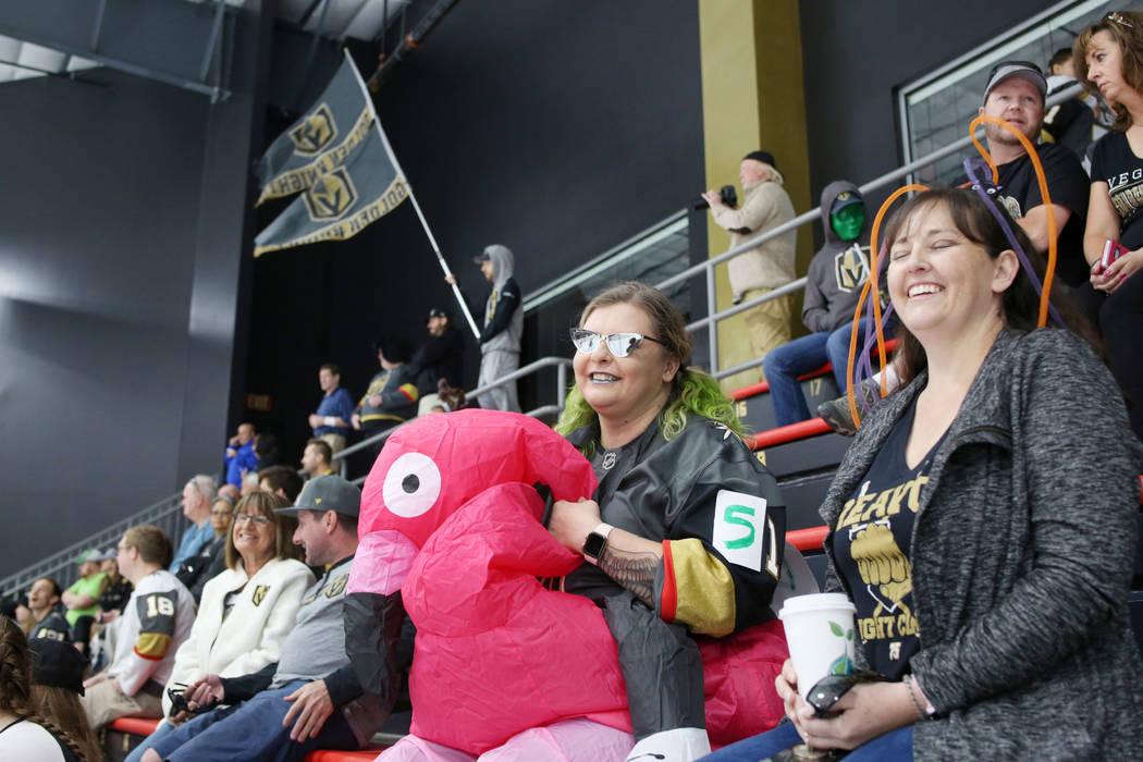 Emily Knight, left, Las Vegas local, and Alexandra Kauffman, Henderson, watch the Golden Knight ...