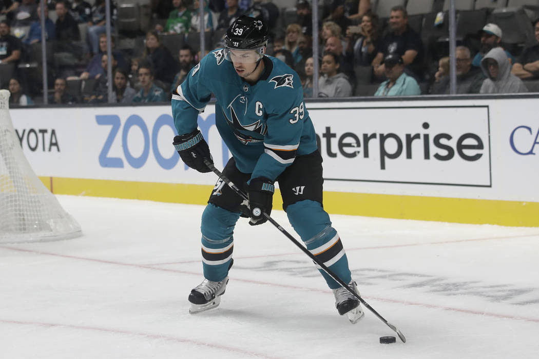 San Jose Sharks center Logan Couture (39) looks to pass the puck against the Vegas Golden Knigh ...