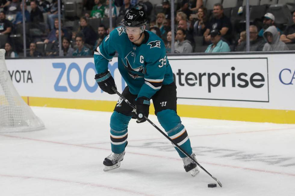 San Jose Sharks center Logan Couture (39) looks to pass the puck against the Vegas Golden Knigh ...