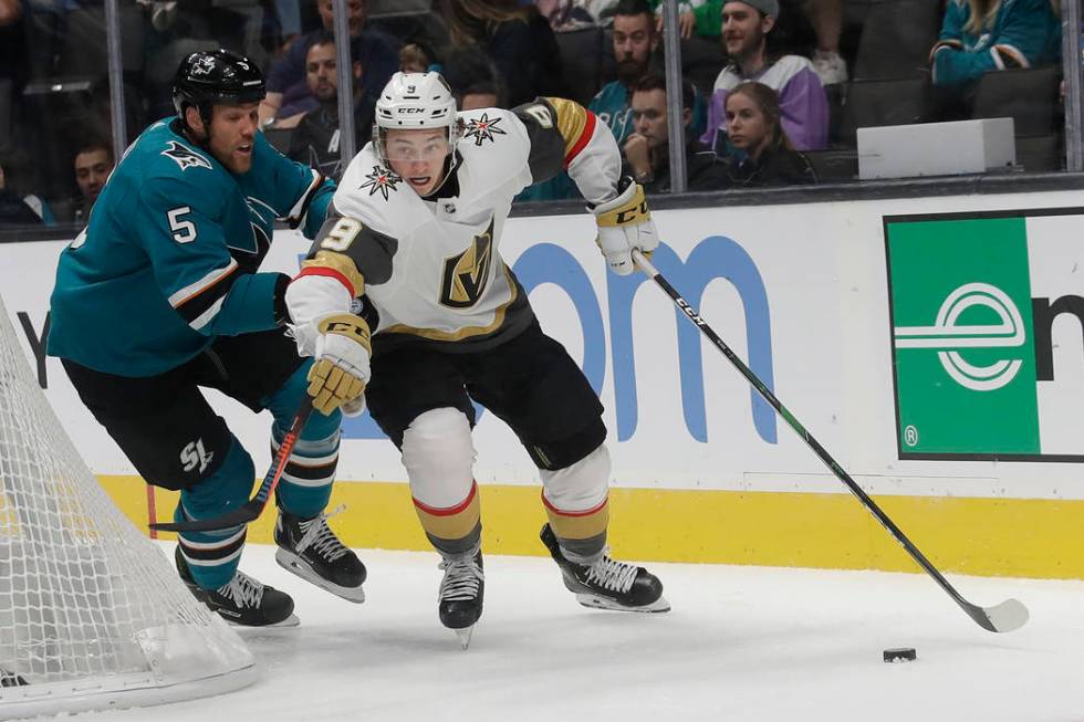 Vegas Golden Knights center Cody Glass (9) skates past San Jose Sharks defenseman Dalton Prout ...