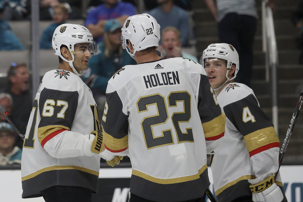 Vegas Golden Knights left wing Max Pacioretty (67) celebrates with teammates after scoring a go ...