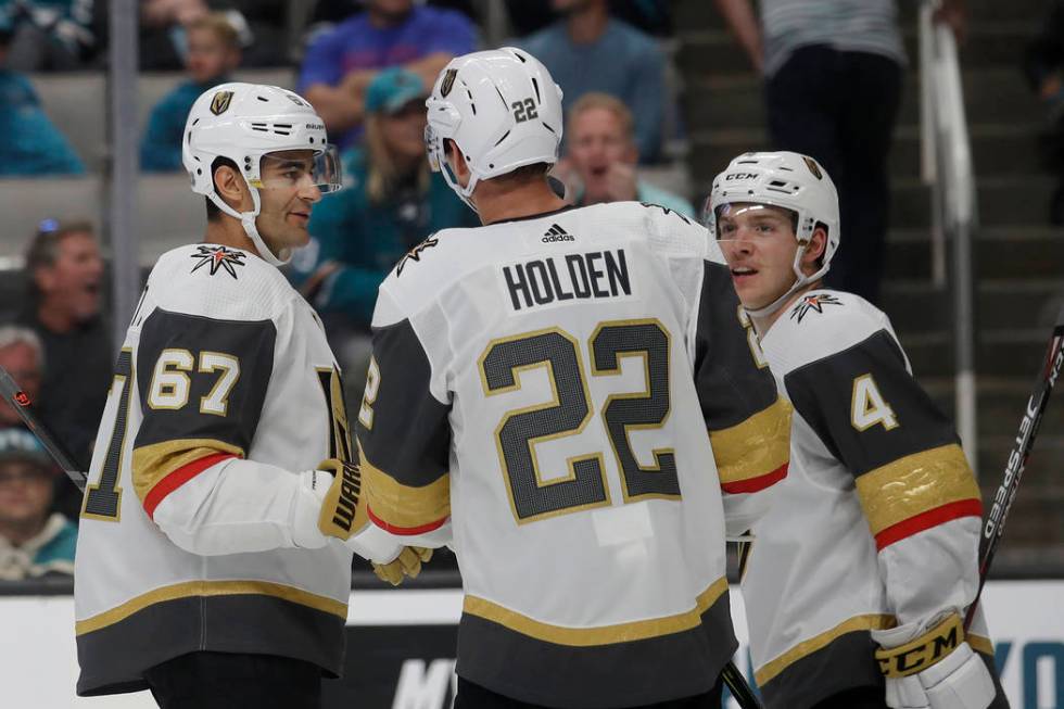 Vegas Golden Knights left wing Max Pacioretty (67) celebrates with teammates after scoring a go ...