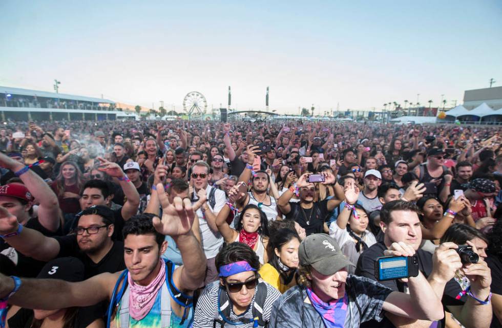 The crowd at the Downtown Stage erupts at the sight of 2 Chainz during the first day of the Lif ...