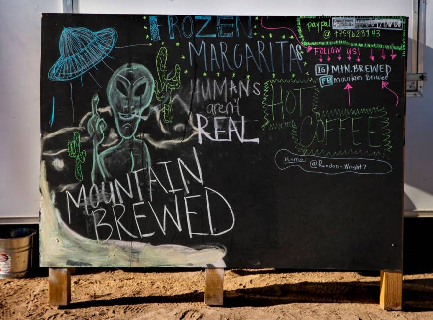 An alien sign for the margarita stand during the Alienstock festival on Saturday, Sept. 21, 201 ...