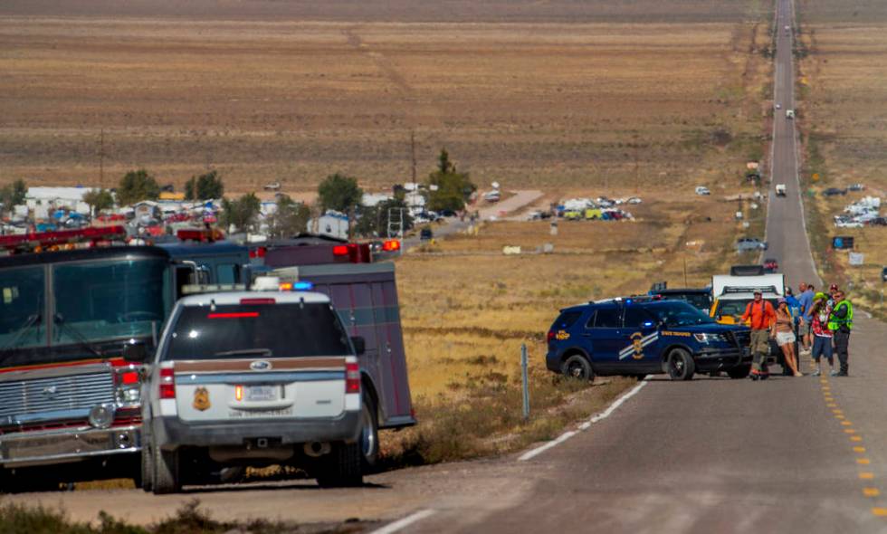 Emergency and medical personnel block off the Extraterrestrial Highway/State Route 375 for a po ...