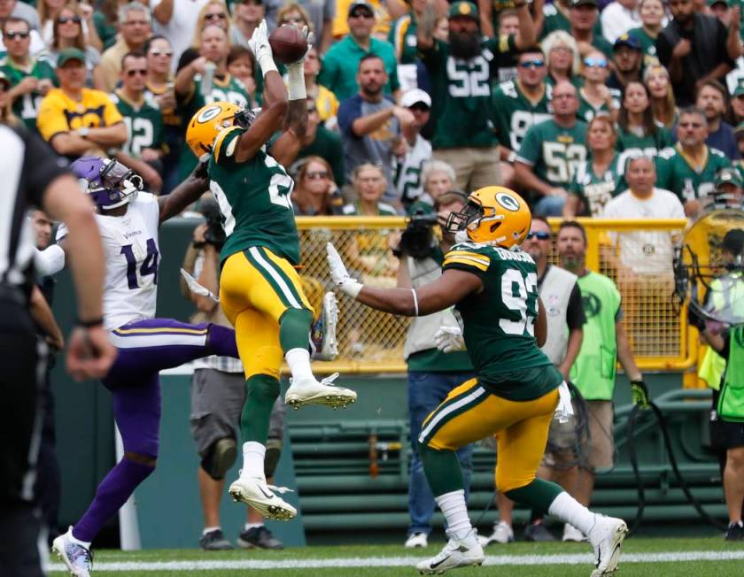 Green Bay Packers' Kevin King intercepts a pass intended for Minnesota Vikings' Stefon Diggs du ...