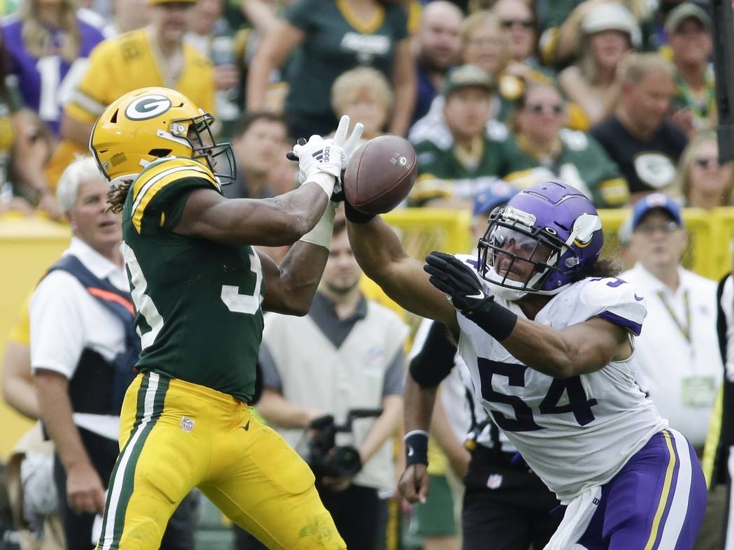 Minnesota Vikings' Eric Kendricks breaks up a pass intended for Green Bay Packers' Aaron Jones ...