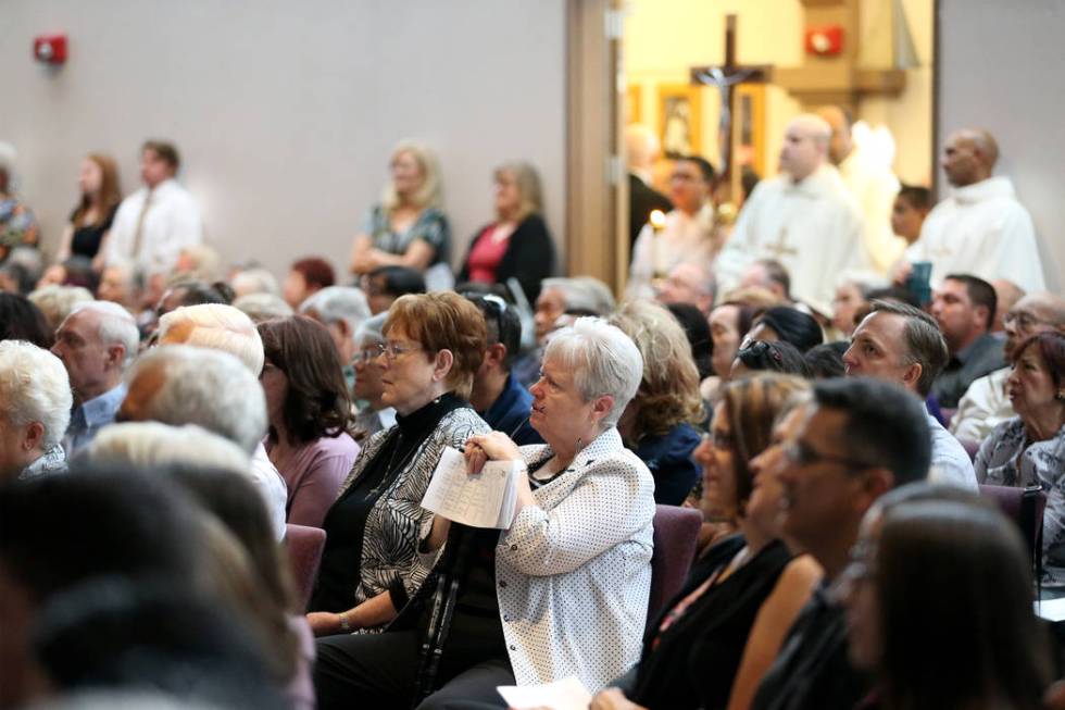 People attend the funeral mass for Paula Davis, an UNLV economics student, at St. John Neumann ...