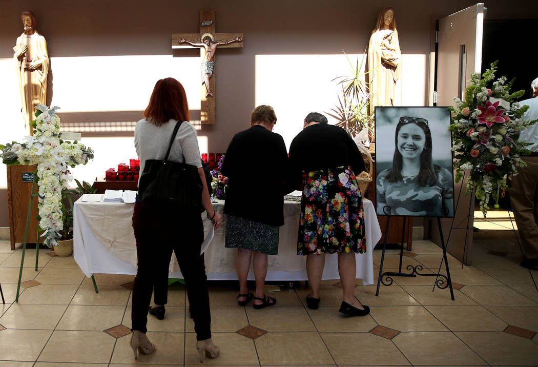 People attend the funeral mass for Paula Davis, an UNLV economics student, at St. John Neumann ...