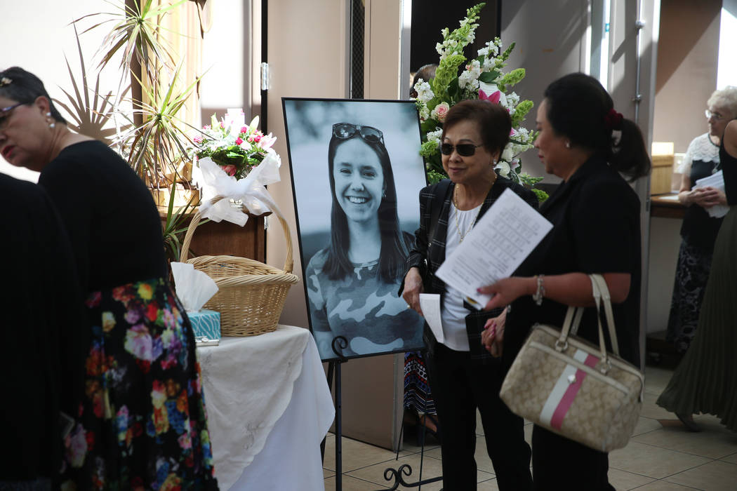 People attend the funeral mass for Paula Davis, a former UNLV economics student, at St. John Ne ...
