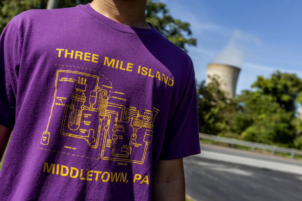 Levi Hess, of Hershey, wears a Three Mile Island shirt from the 1980's, before a press conferen ...