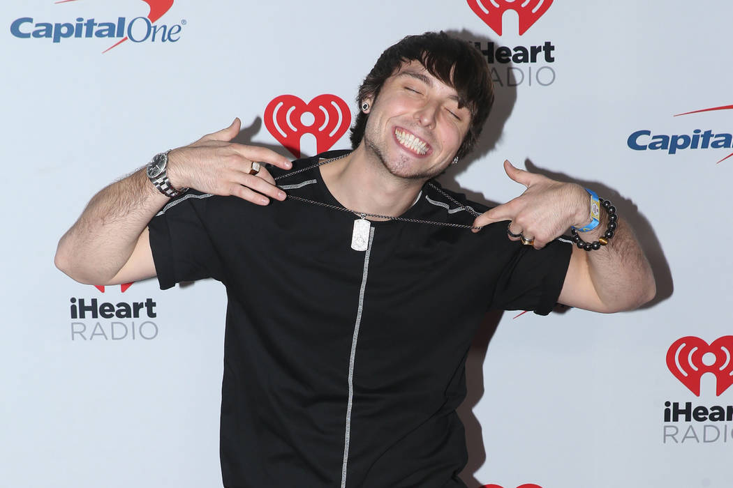 Wesley Stromberg poses on the iHeartRadio red carpet at T-Mobile Arena in Las Vegas, Saturday, ...