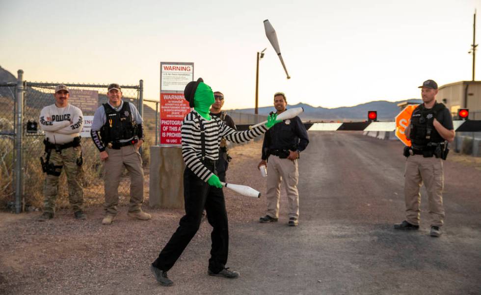 Scott Samford of Hollywood as an alien juggling mime entertains the security personnel at the b ...