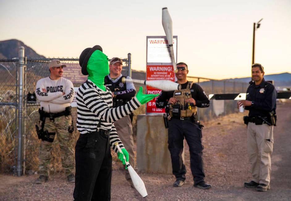 Scott Samford of Hollywood as an alien juggling mime entertains the security personnel at the b ...