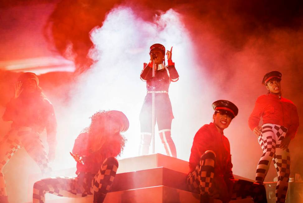 Janelle Monáe, top/middle, performs on the Bacardi Stage during the second day of Life is ...