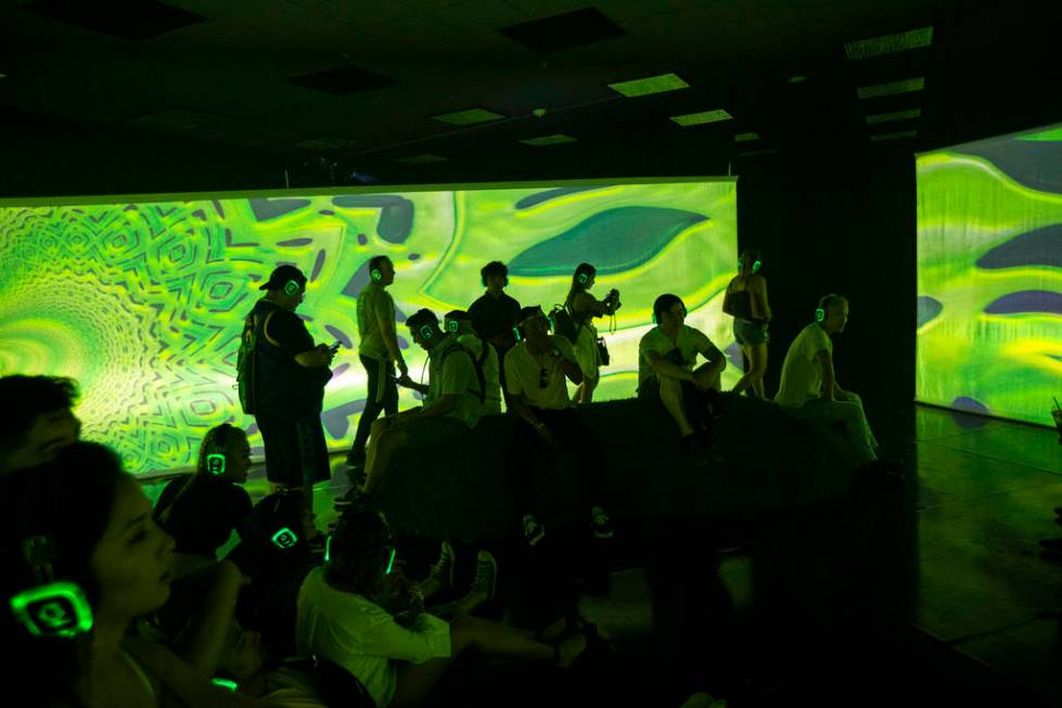 Attendees relax in the immersive Forest Bath experience during the Life is Beautiful festival i ...