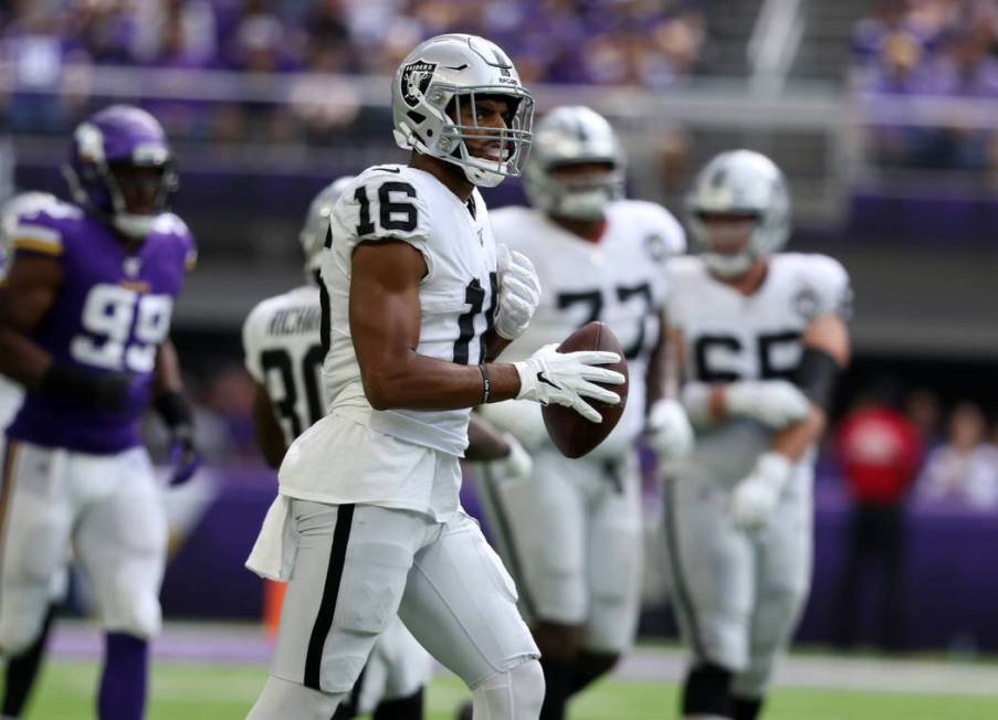 Oakland Raiders wide receiver Tyrell Williams (16) holds on the football after making a catch d ...