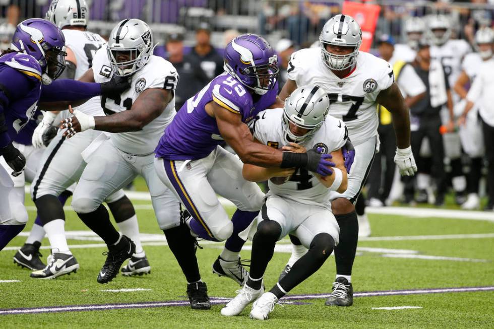 Minnesota Vikings defensive end Danielle Hunter (99) sacks Oakland Raiders quarterback Derek Ca ...