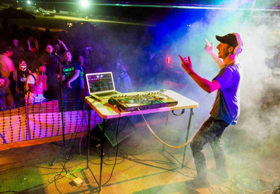 DJ Initiate performs before festivalgoers on the main stage during the Alienstock festival on S ...
