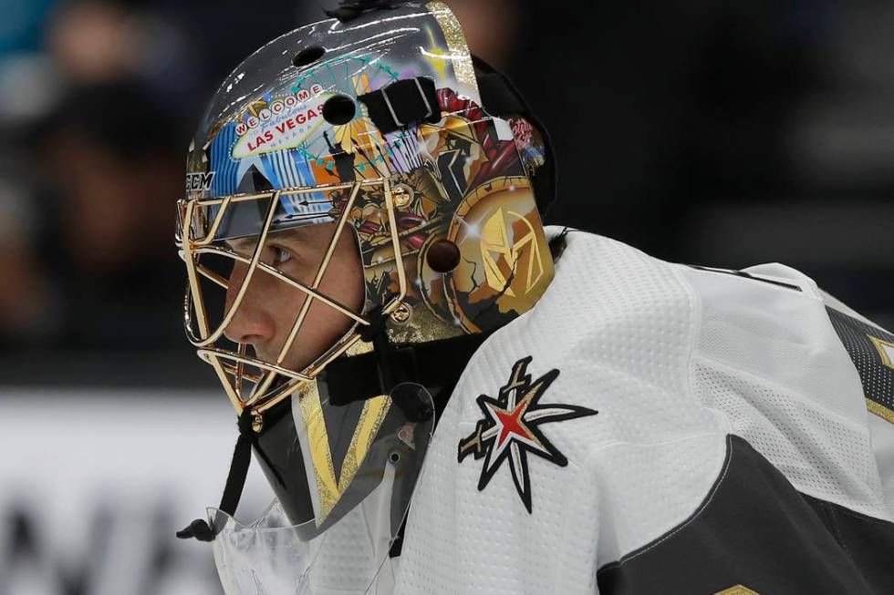 Vegas Golden Knights goaltender Marc-Andre Fleury watches action while defending his net during ...