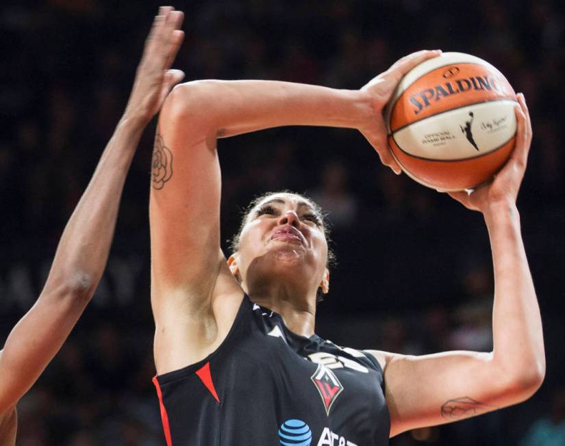 Las Vegas Aces center Liz Cambage (8) drives to the basket in the second quarter of Vegas' WNBA ...