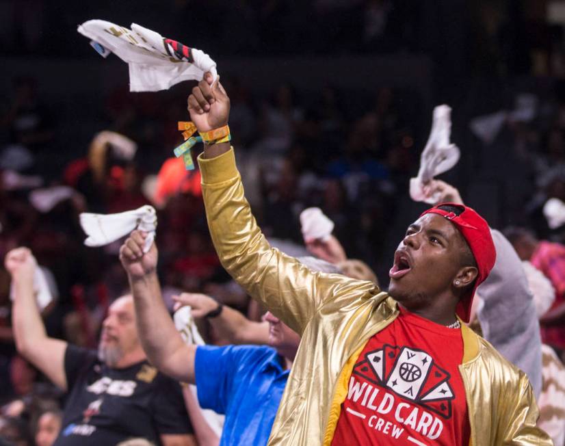 Las Vegas Aces Wild Card Crew member Jeremiah Williams fires up the crowd in the second quarter ...