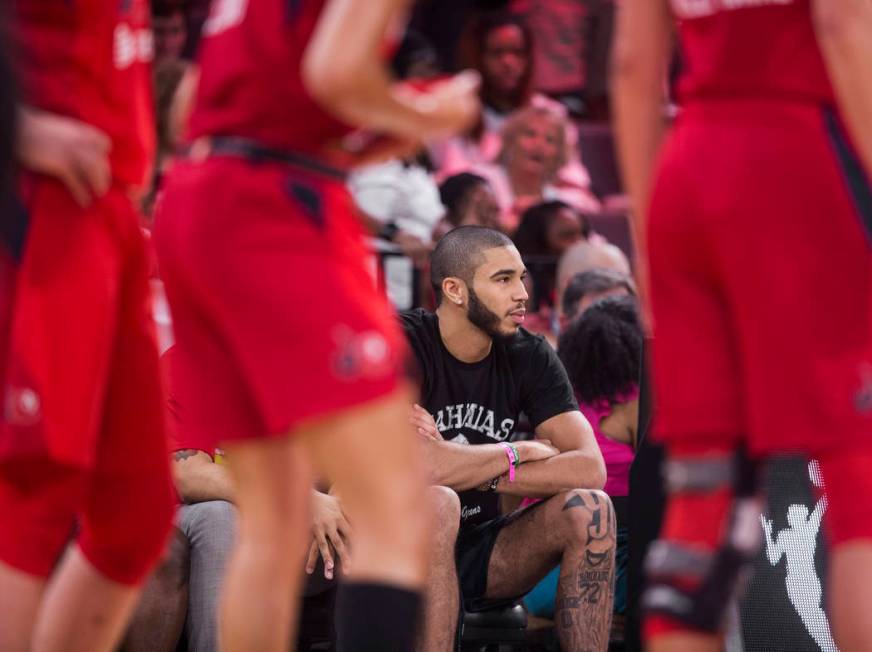 Boston Celtics forward Jayson Tatum watches the Las Vegas Aces WNBA semifinals game with the Wa ...