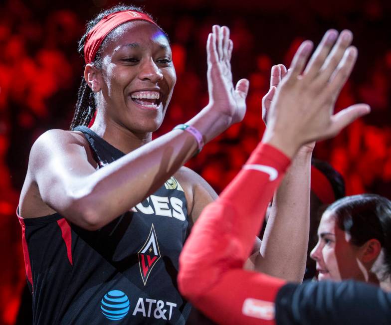 Las Vegas Aces center A'ja Wilson (22) gets fired up with teammates before the start of Vegas' ...