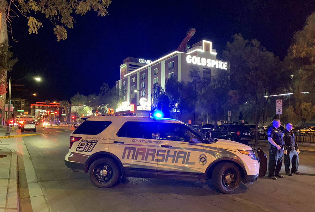 A large law enforcement presence is visible Thursday, Aug. 22, 2019, in downtown Las Vegas, at ...
