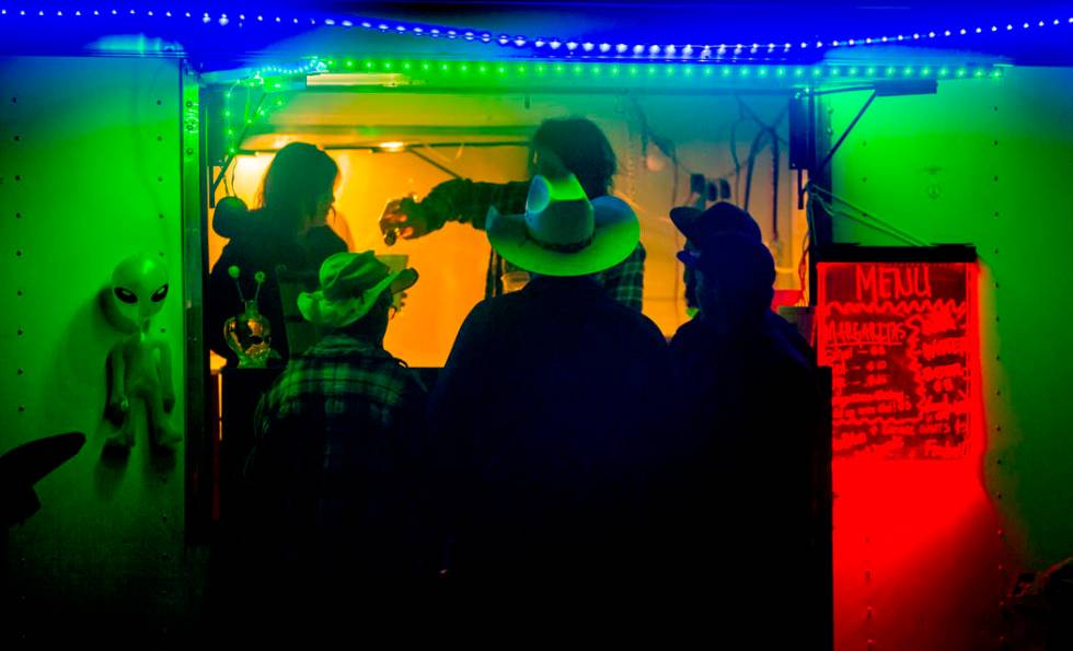 Festivalgoers stop by for a fresh margarita from Pioche vendors during the Alienstock festival ...