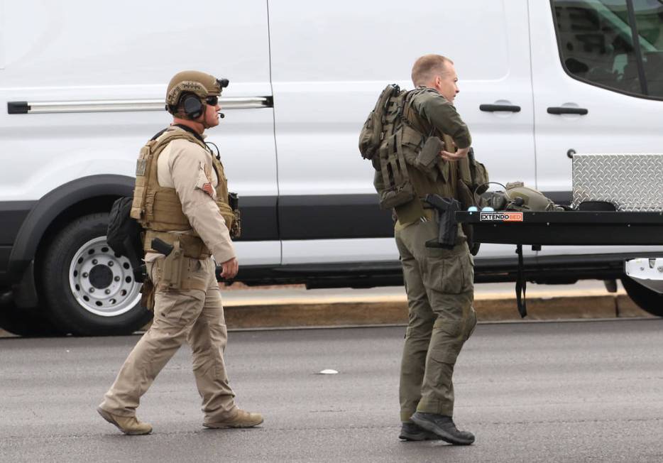 Metro SWAT unit arrive where Las Vegas police responded to an attempted robbery that turned int ...