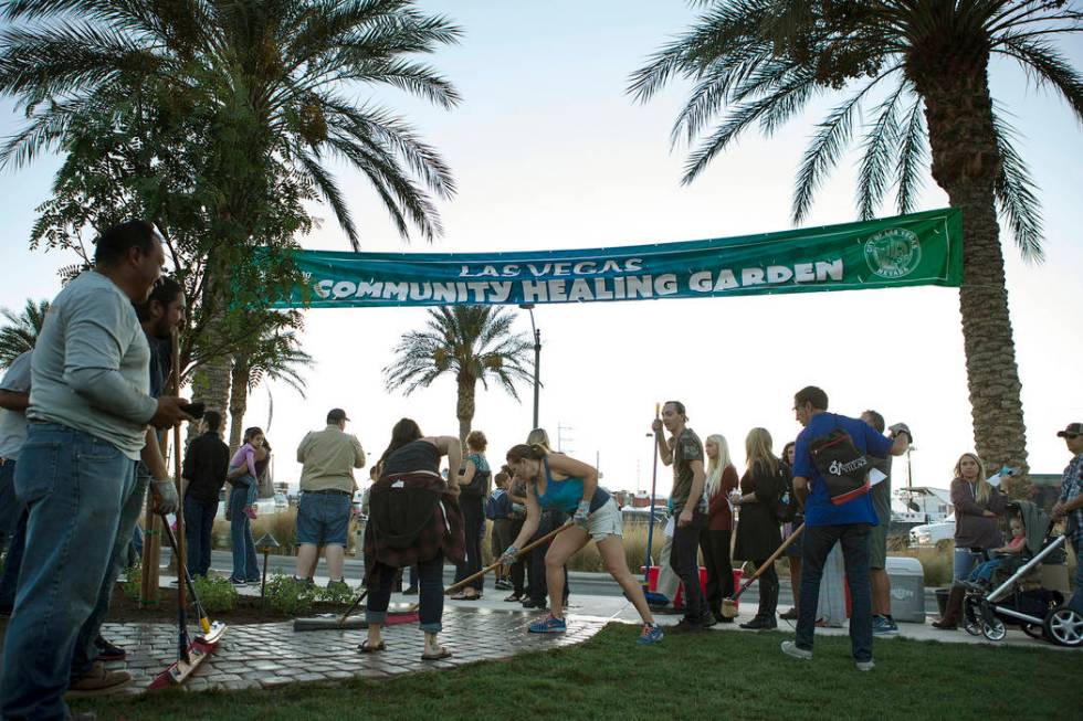 People prepare the Community Healing Garden in Las Vegas, Friday, Oct. 6, 2017. The city of Las ...