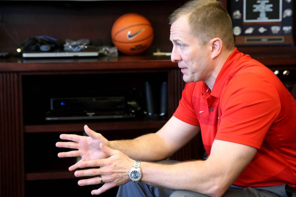 New UNLV basketball coach T.J. Otzelberger talks to a reporter in his office at the Thomas &amp ...