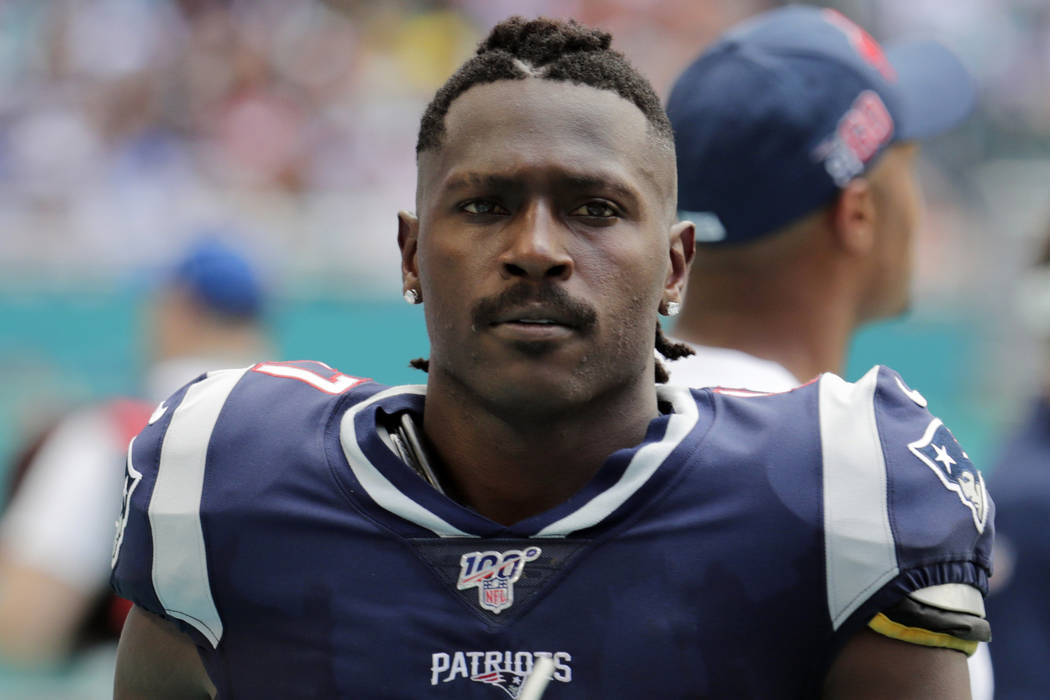 Then New England Patriots wide receiver Antonio Brown (17) on the sidelines,during the first ha ...