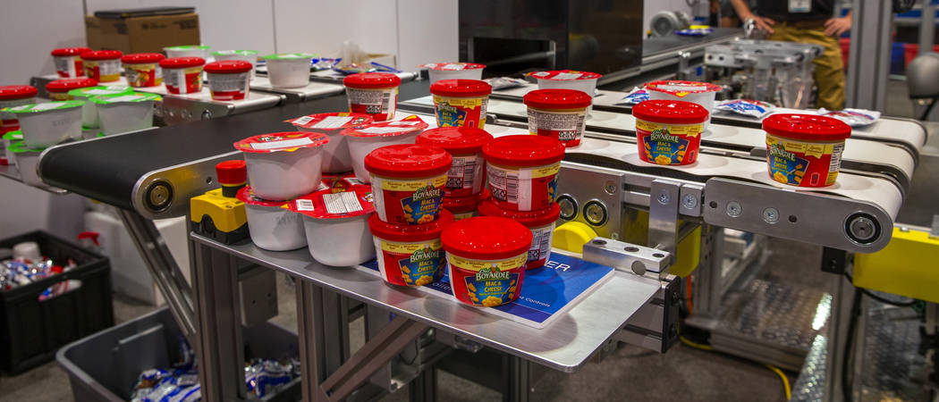 Robots from Allied Technology and Universal Robots are packing school lunches for kids through ...