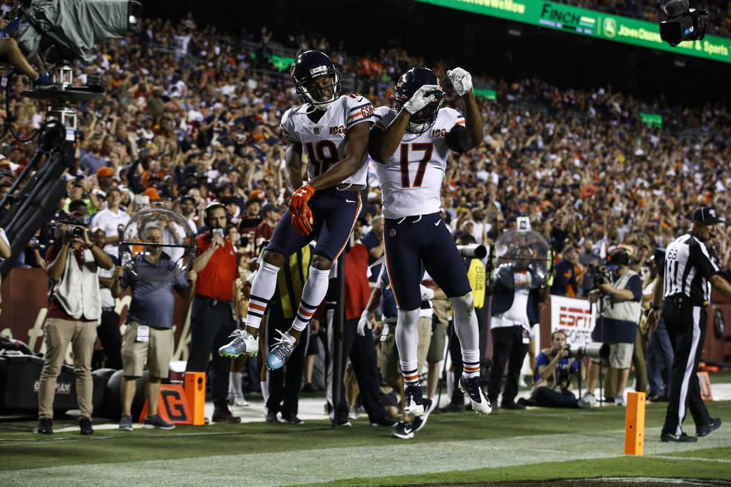 Chicago Bears wide receiver Taylor Gabriel (18) celebrates his touchdown pass with wide receive ...