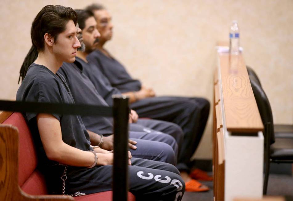 Giovanni Ruiz, 21, left, waits in North Las Vegas Justice Court, Tuesday, Sept. 24, 2019. Ruiz ...