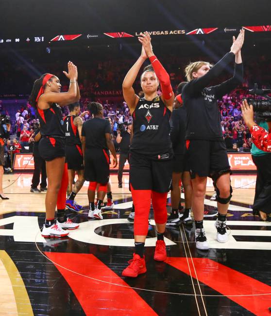 Members of the Las Vegas Aces acknowledge their fans after losing to the Washington Mystics in ...