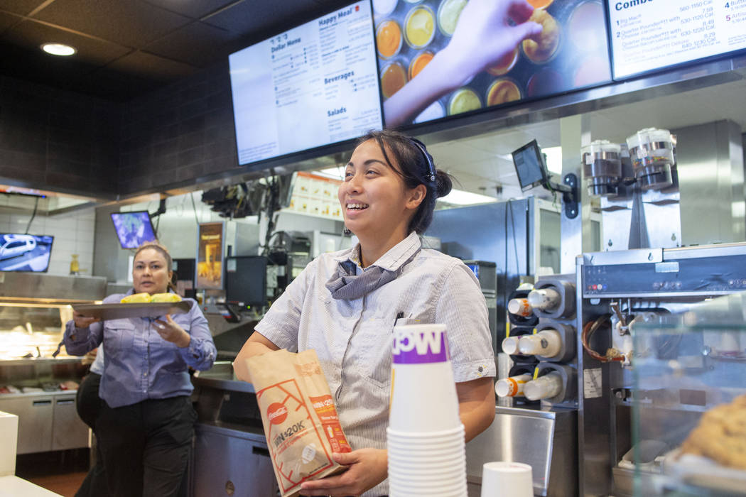 Shift manager Krizia Zamora fulfills an order at the McDonald's on the corner of Sahara Avenue ...