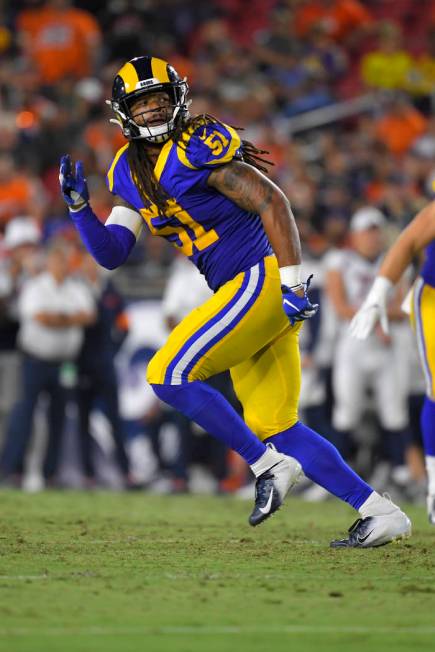 Los Angeles Rams linebacker Dakota Allen runs a play during a preseason NFL football game again ...