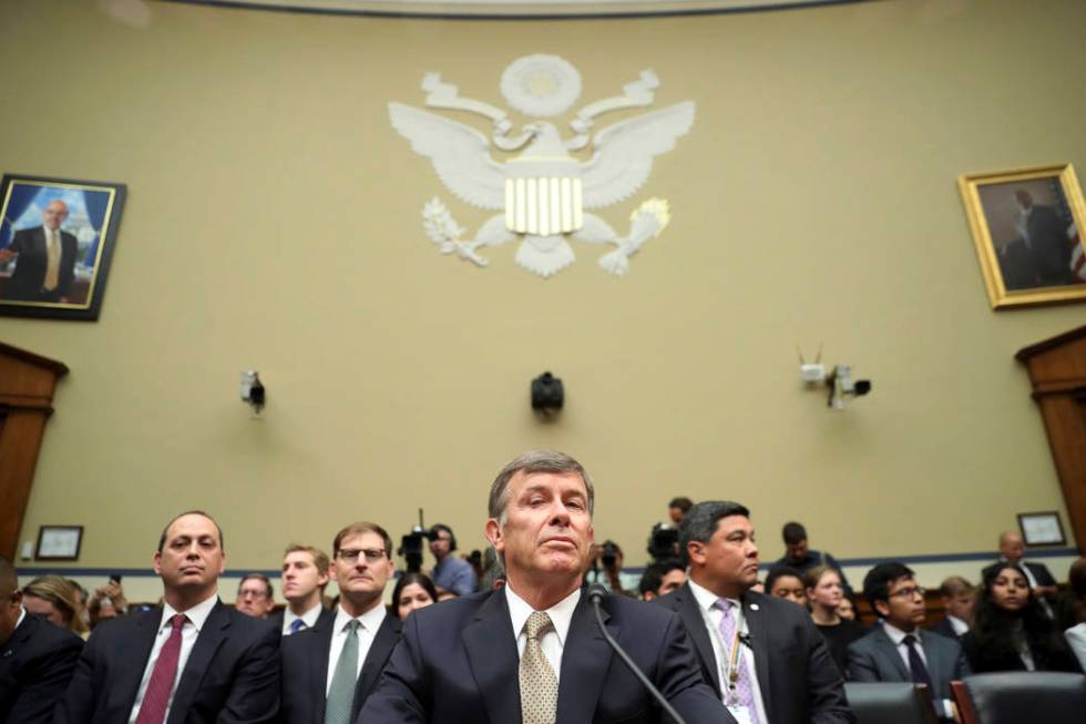 Acting Director of National Intelligence Joseph Maguire takes his seat before testifying before ...