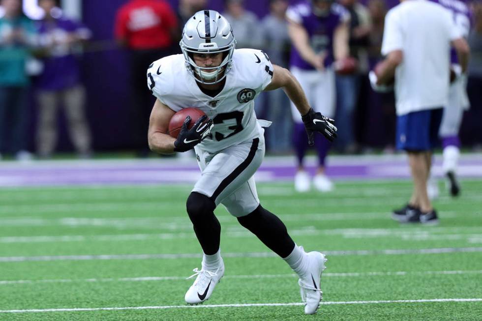 Oakland Raiders wide receiver Hunter Renfrow (13) runs through a drill prior to the start of an ...