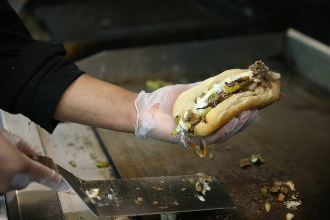 Chef Jose Rivera makes a philly steak sandwich at Angelina's Pizzeria in Las Vegas on Thursday, ...
