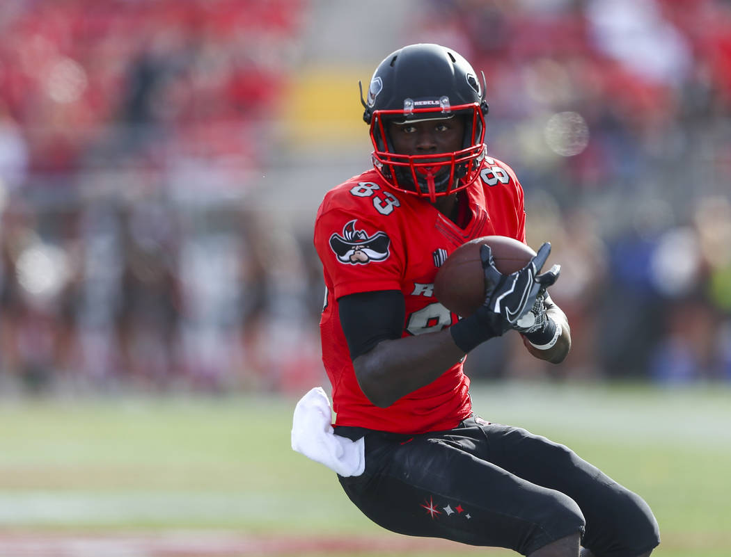 UNLV wide receiver Devonte Boyd (83) catches a pass during a football game against Wyoming at S ...